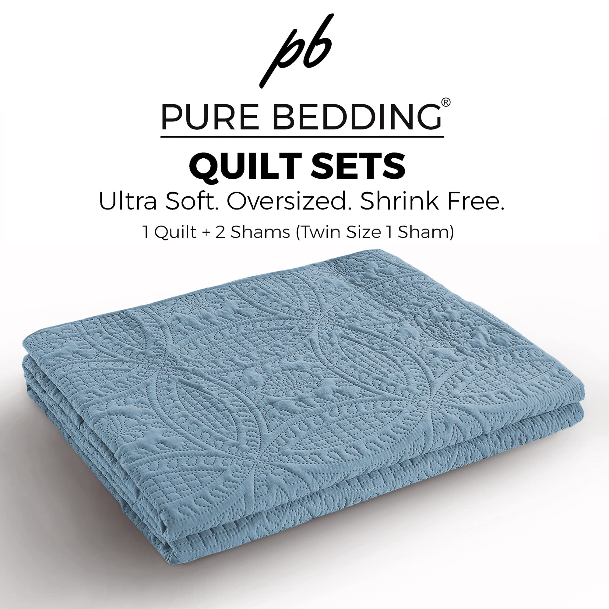 Pure Bedding quilt size comparison on mattress displays generous coverage and tailored drop for complete bed styling
