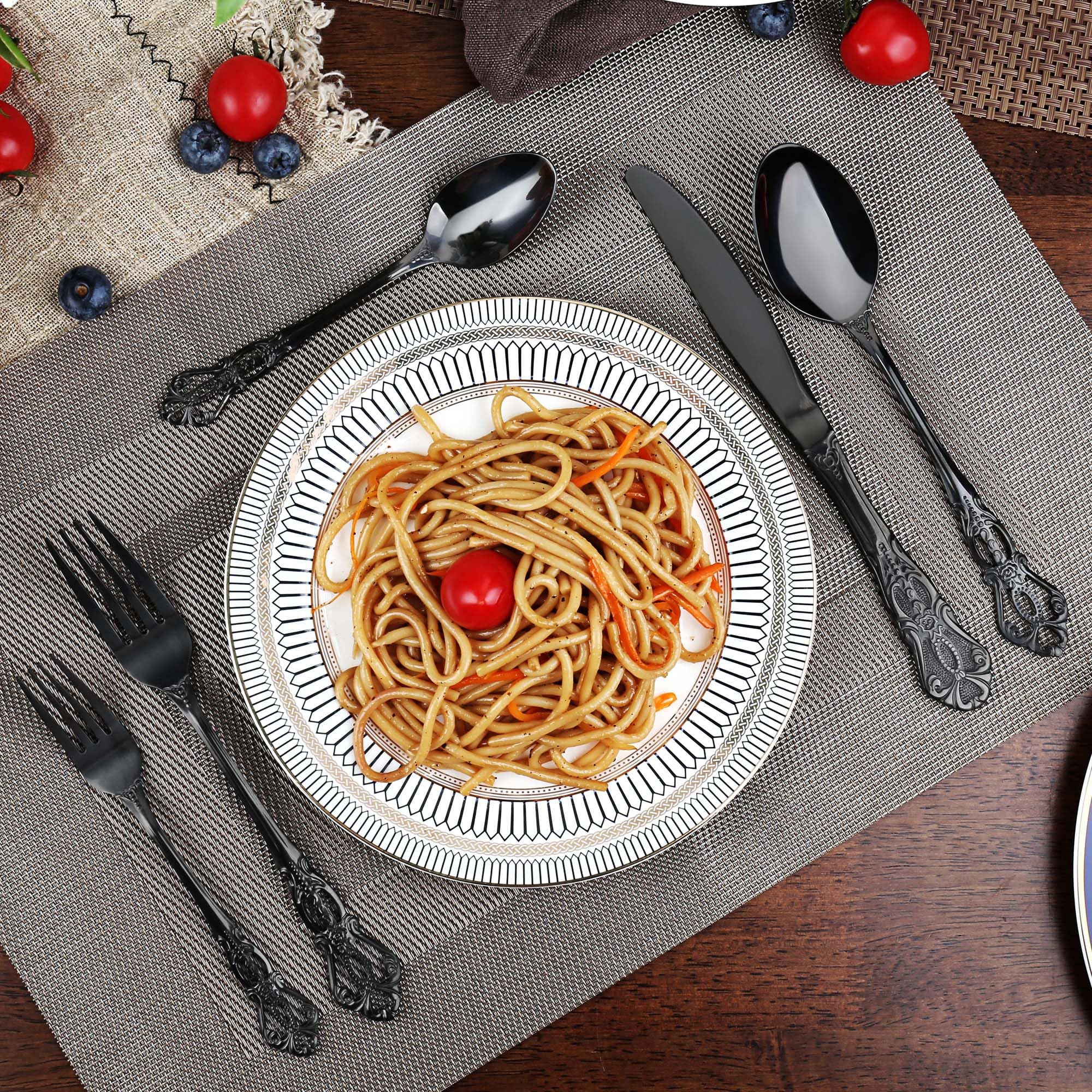 PUREAIN utensils beside a fork and phone for scale showing true size and proportion