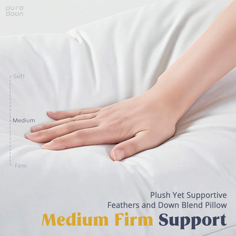 puredown pillows arranged on a made bed illustrating real-life bedroom comfort and style