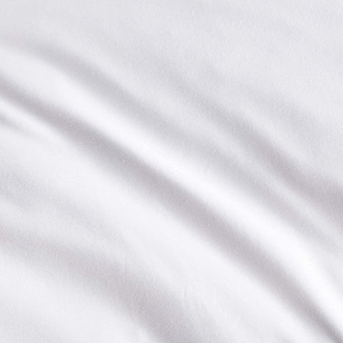 puredown pillow next to ruler showing true king size scale