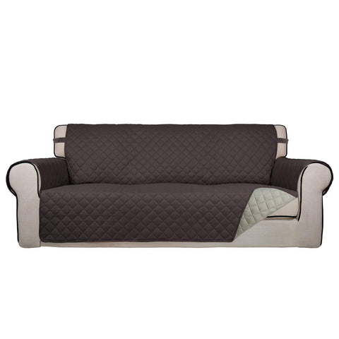 PureFit front view on oversized sofa showing full coverage and neat fit