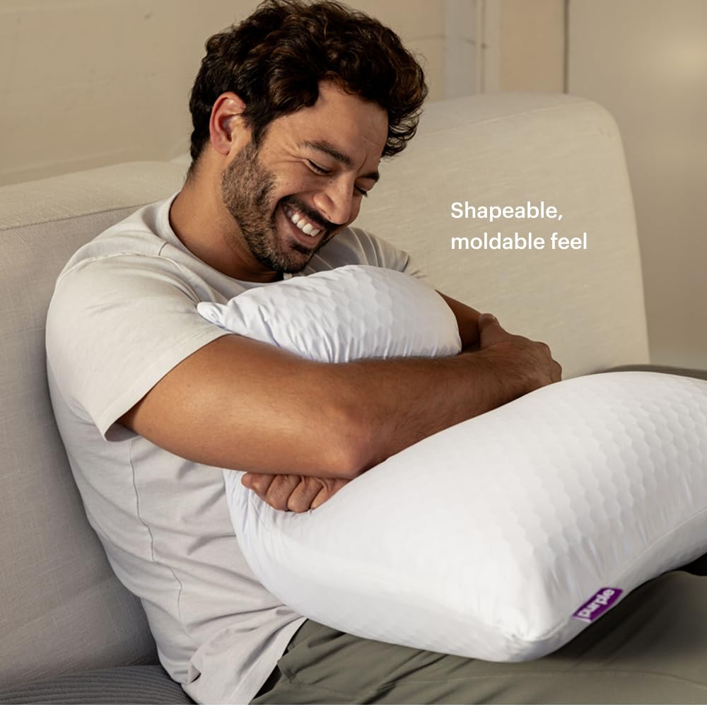Bedroom scene with Purple pillow on bed showing comfort and cool-sleep benefit