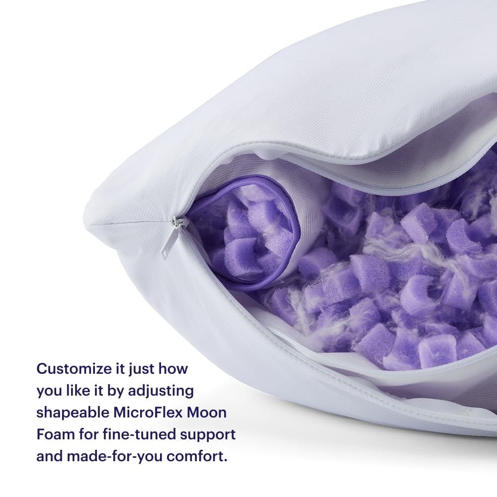 Standard pillow beside a hand to show scale and personalized fit from Purple