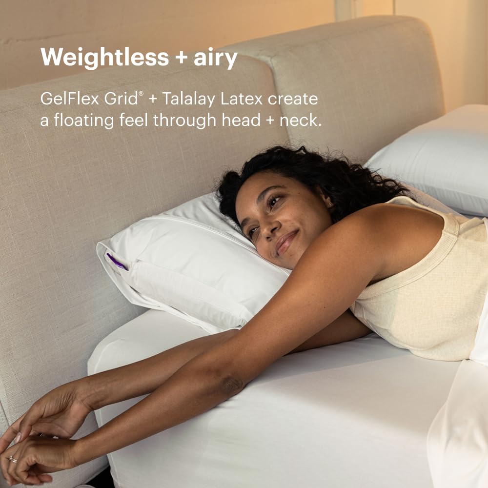 Purple Harmony Pillow on made bed showing cooling comfort for hot sleepers