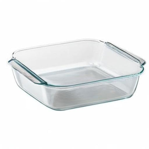 Pyrex dish on table with casserole demonstrating oven-to-table serving convenience
