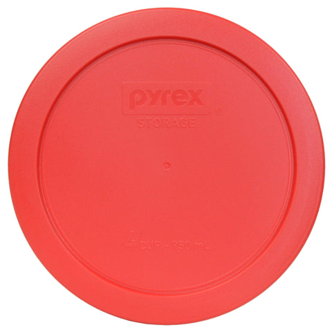 Stacked Pyrex 7201 bowls beside a measuring cup showing size and space-saving