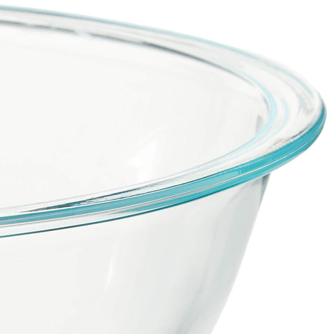 Pyrex bowls in kitchen with salad showing reheating and serving convenience