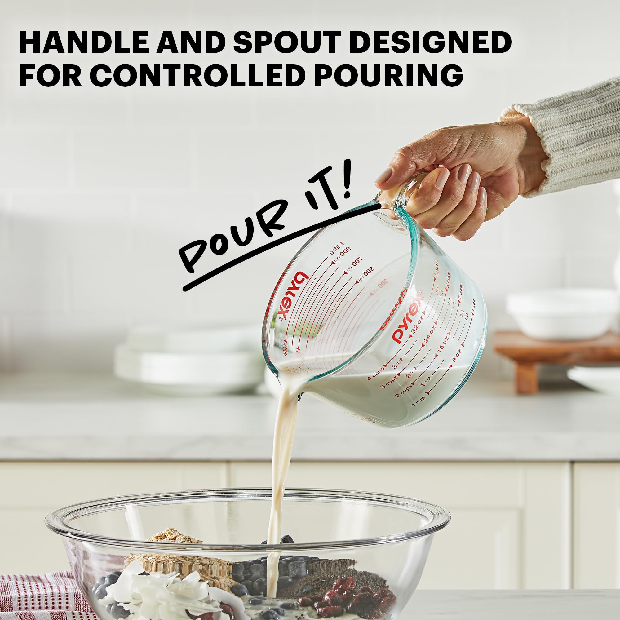 Pyrex 4-cup pouring action demonstrating controlled drip-free transfer benefit