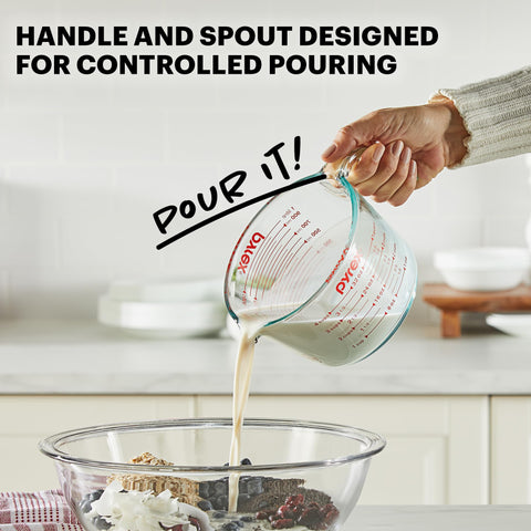 Pyrex 4-cup pouring action demonstrating controlled drip-free transfer benefit