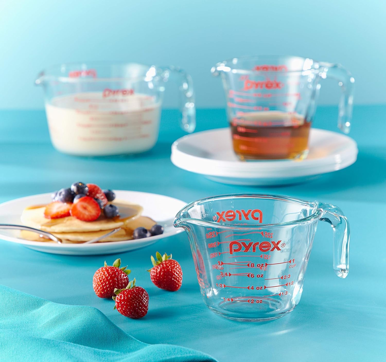 Pyrex cups in a kitchen lifestyle scene showing ease of use during meal prep