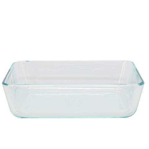 Pyrex lid snapped on glass demonstrating leak-resistant closure for transport