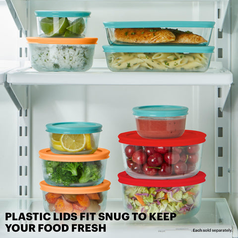 Pyrex colored BPA-free lids snapped on glass demonstrating secure fit