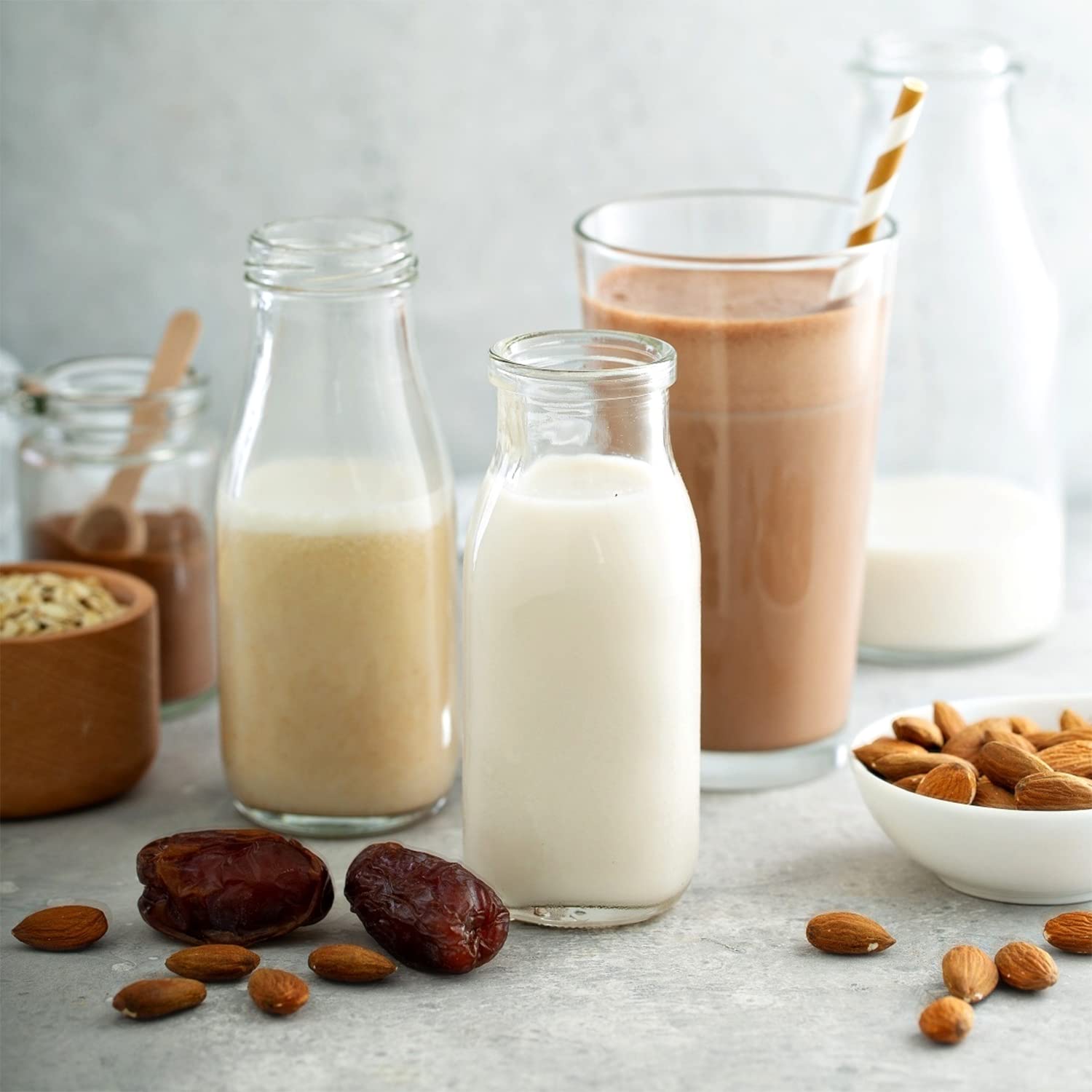 QAPPDA bottles with smoothies stored in fridge demonstrating space-saving and visibility