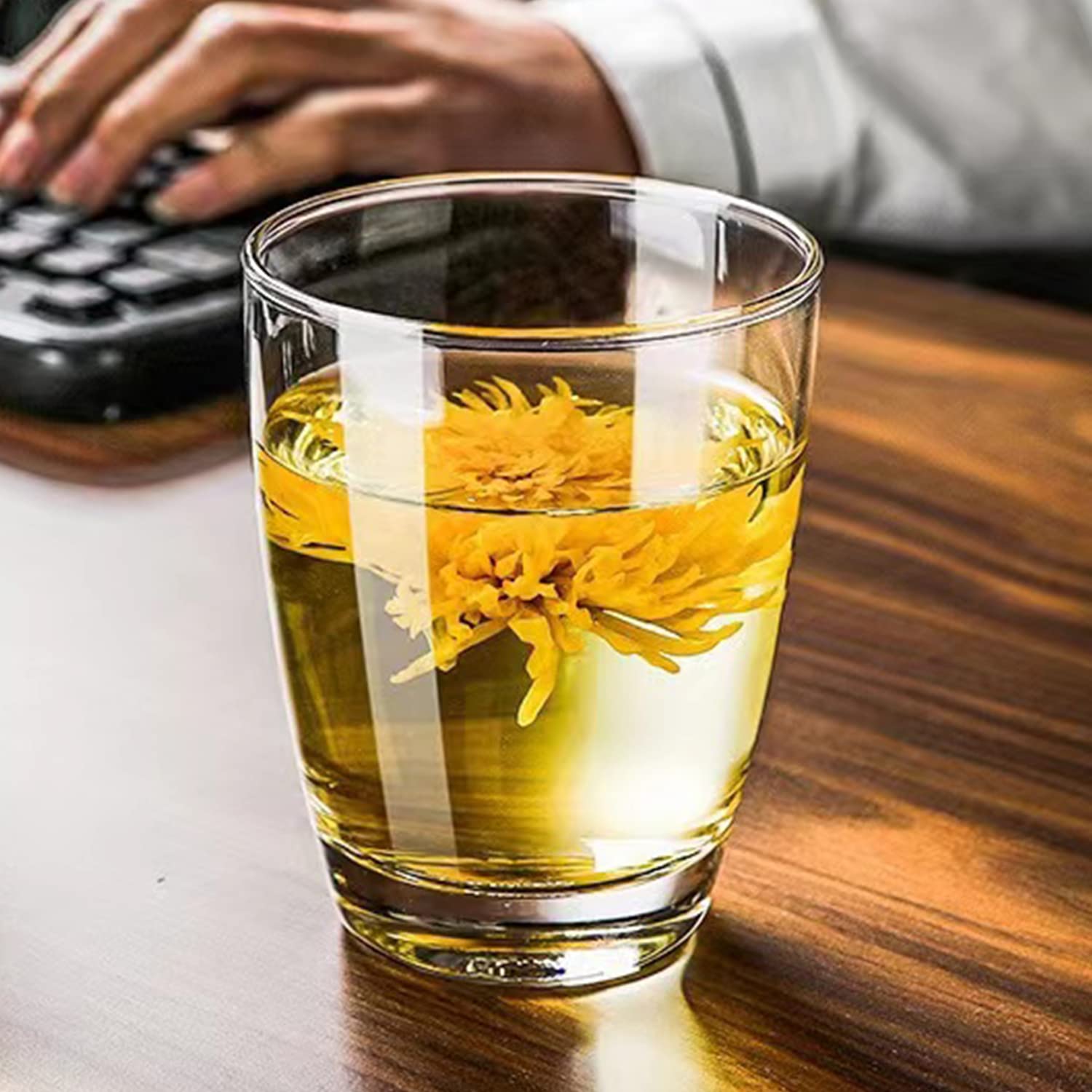 QAPPDA tumblers on table with mixed drinks showing versatile entertaining use