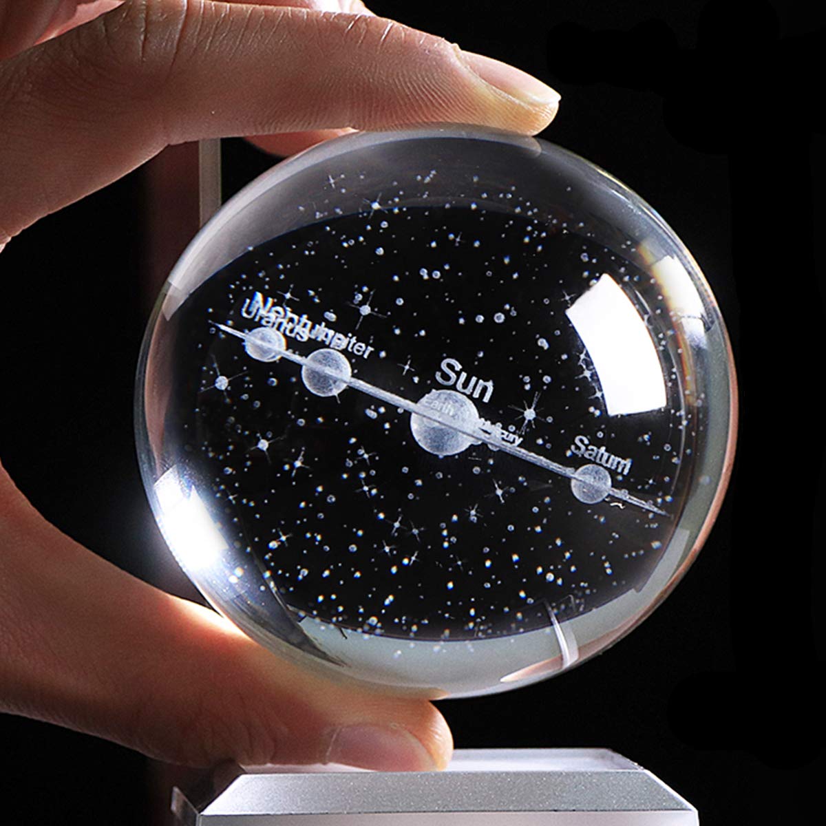 Qianwei crystal ball styled on a bedroom shelf providing educational décor and ambiance