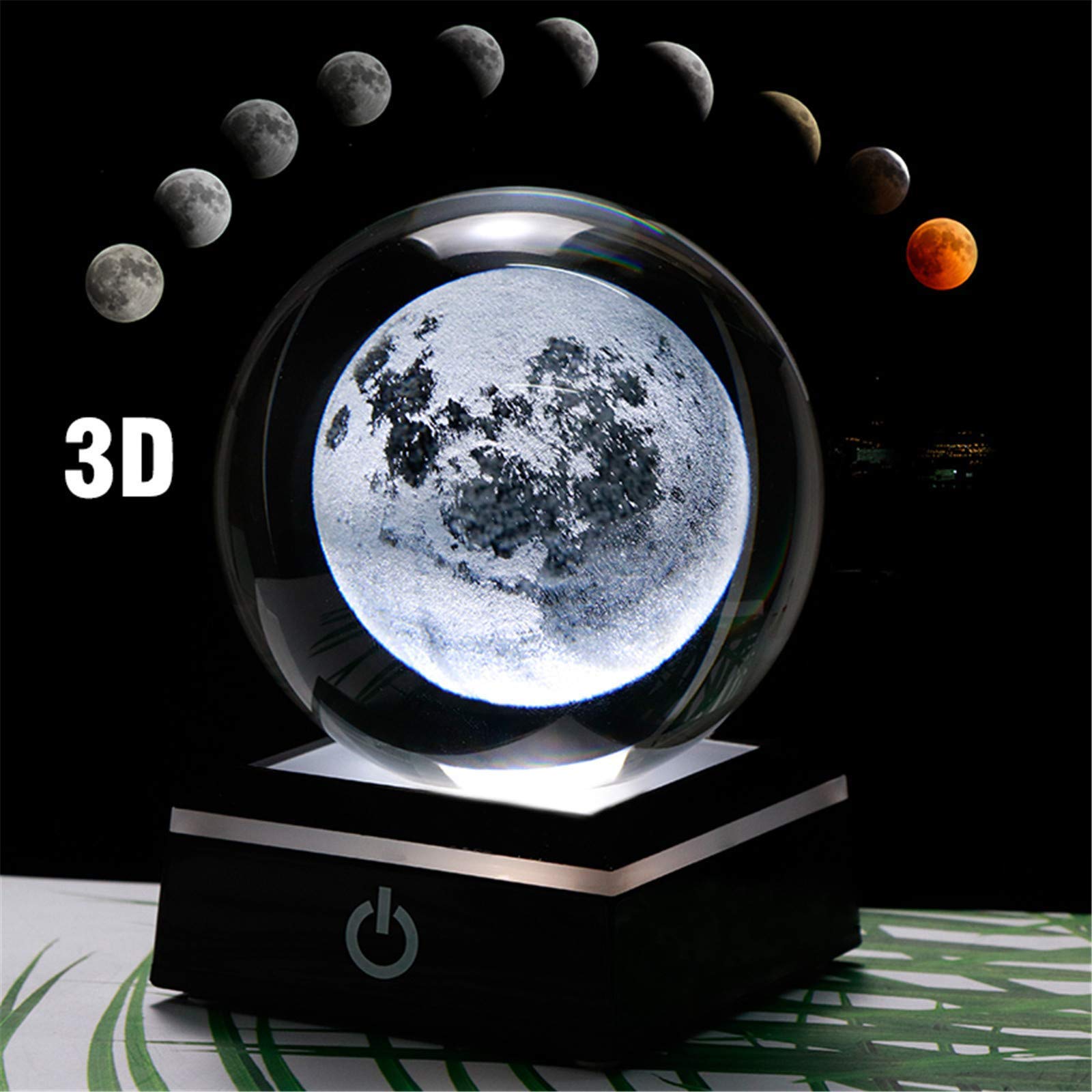 Qianwei crystal ball held in hand to show scale and portability