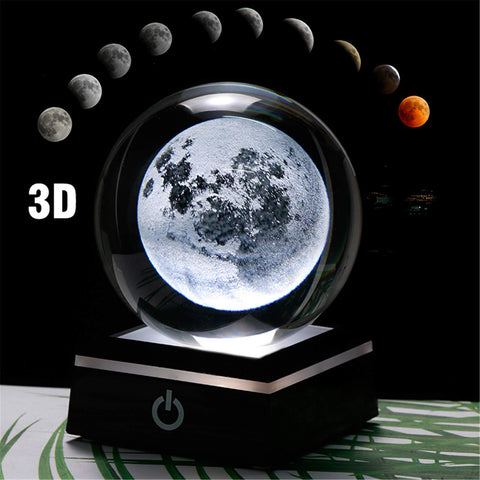 Qianwei crystal ball held in hand to show scale and portability