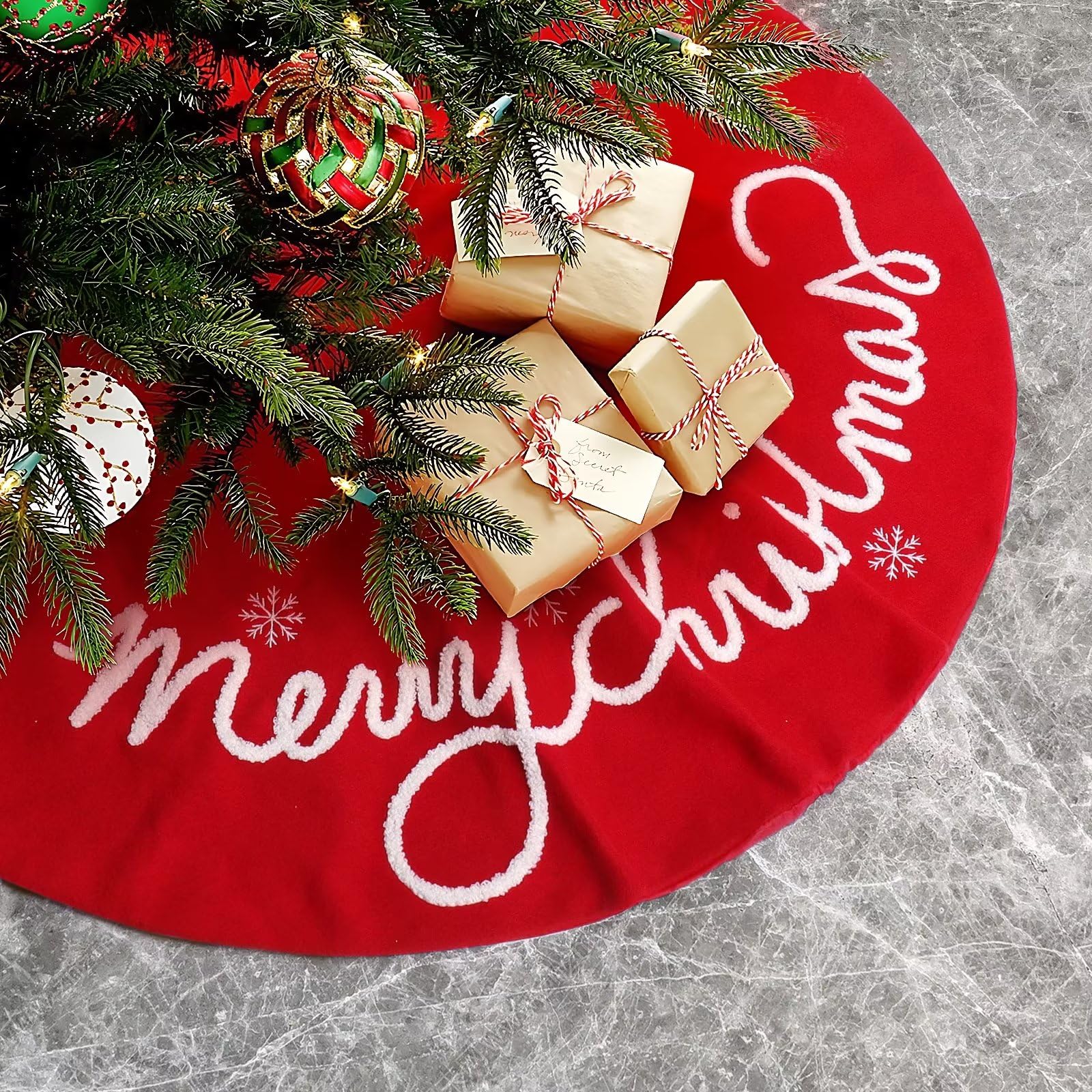 QLEKEY front view of red tree skirt showing Merry Christmas pattern and festive benefit
