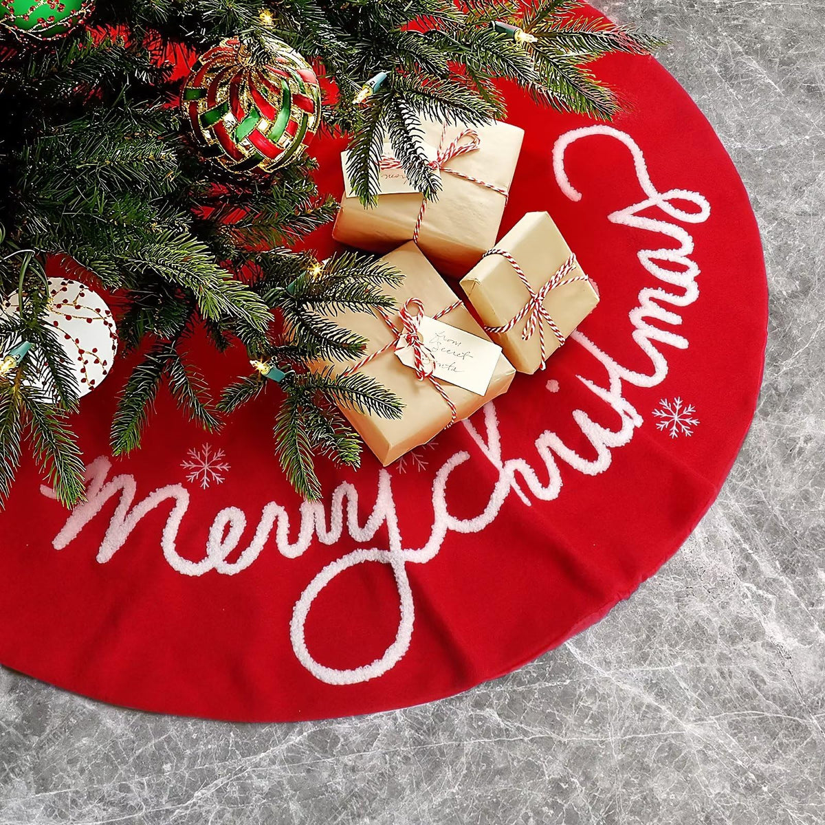 QLEKEY front view of red tree skirt showing Merry Christmas pattern and festive benefit