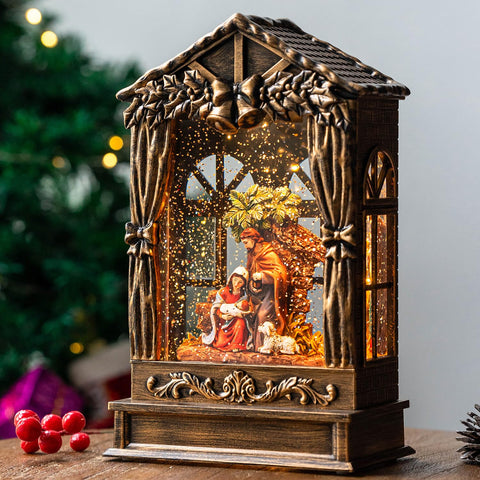 Qualdout front view nativity globe showing illuminated manger scene for warm decoration