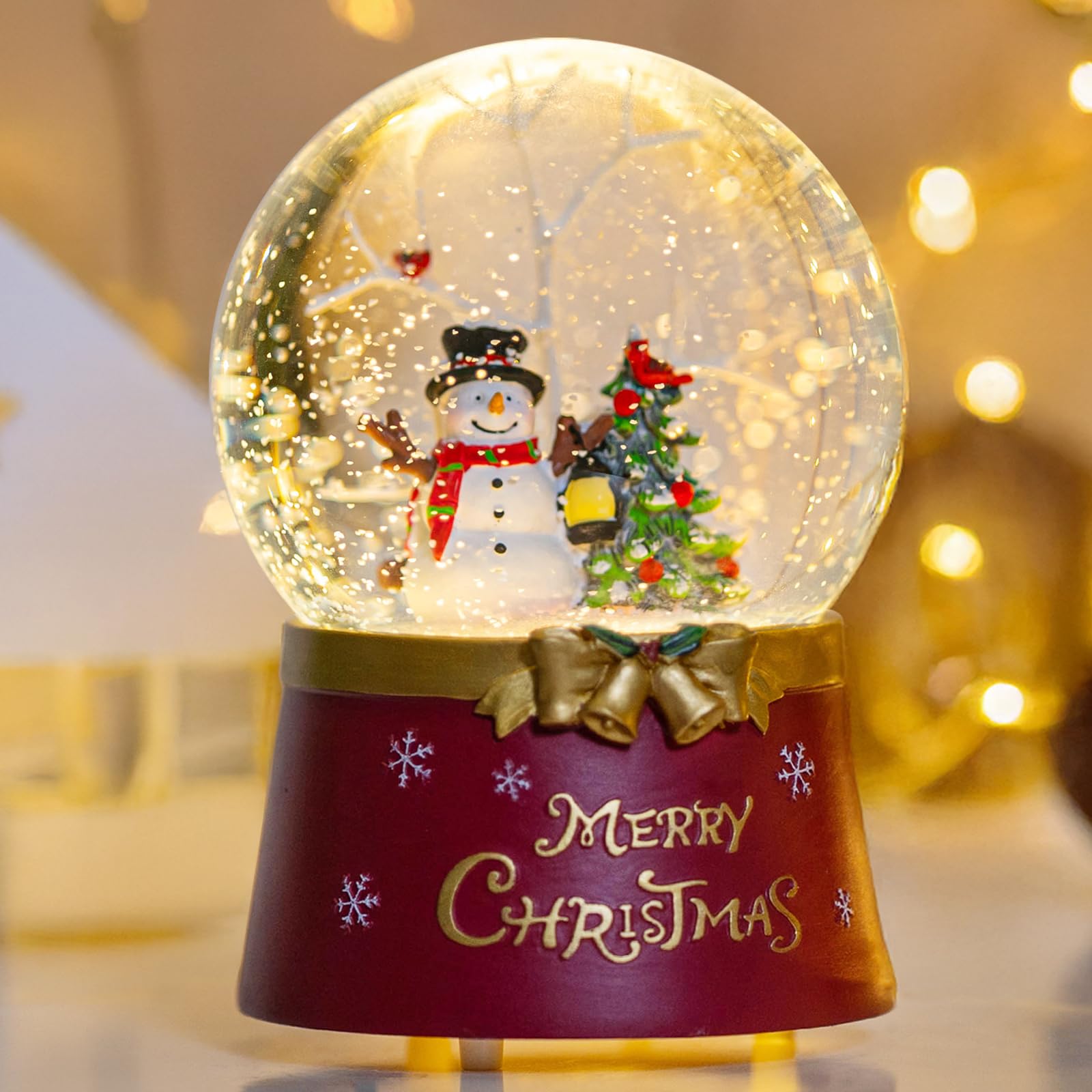 Qualdout front view snow globe lantern showing warm glow and festive look