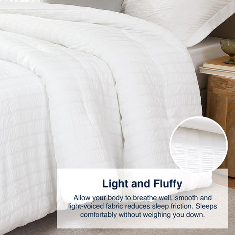 Quataly comforter next to ruler to show full-size 82x86 inch scale