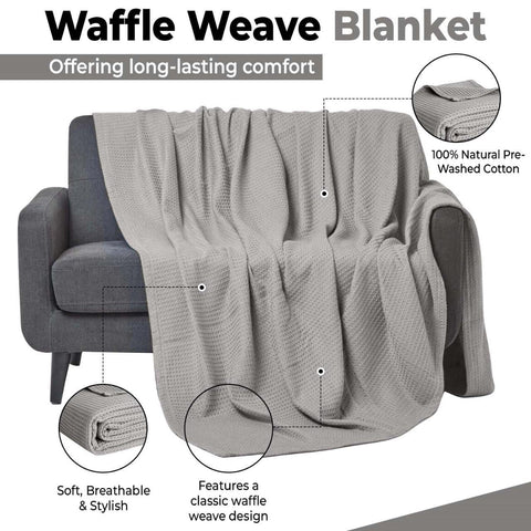 QUBA LINEN blanket draped on sofa in living room for cozy, versatile styling benefit
