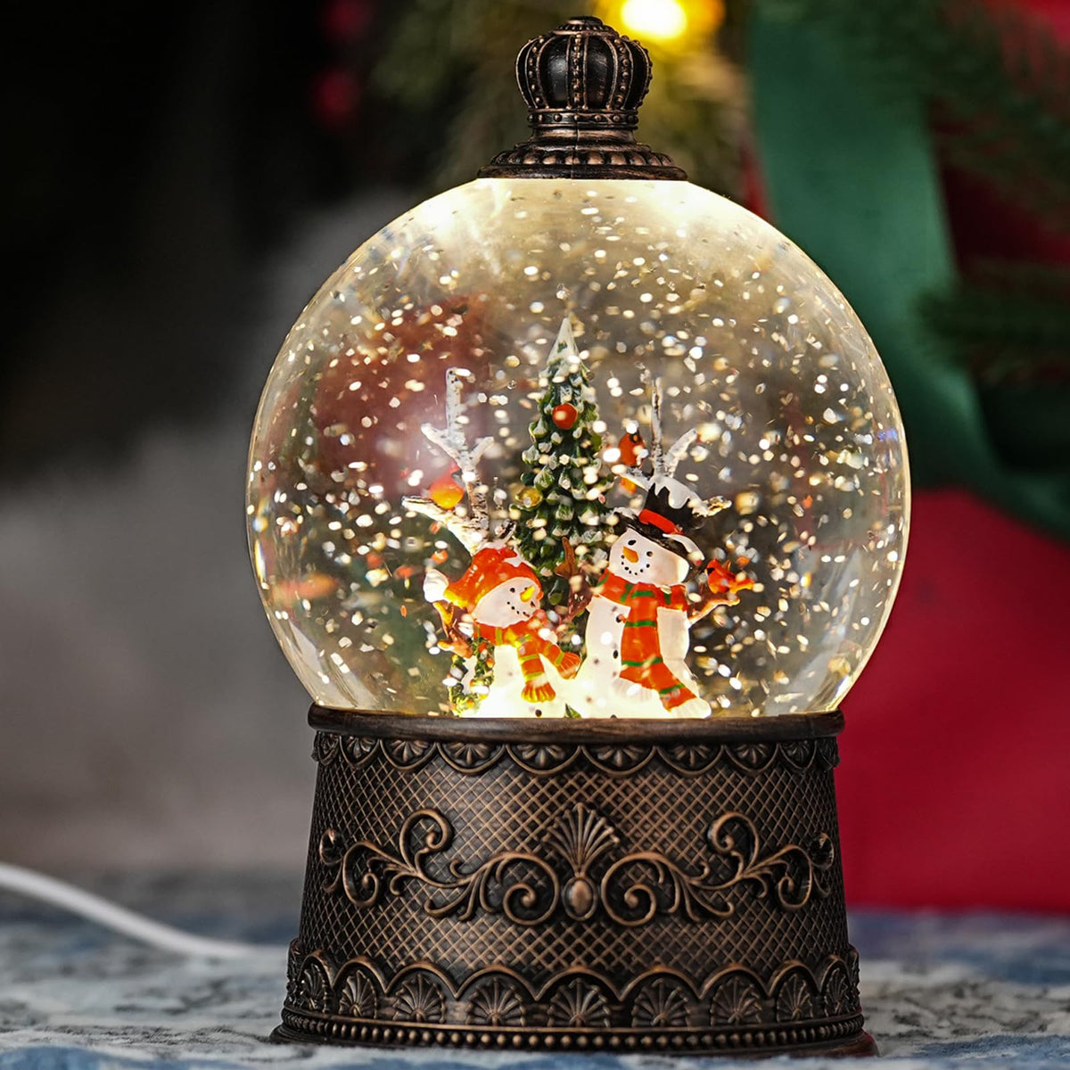 Qukulov front view snowman globe showing warm glow and festive figure benefit ambiance