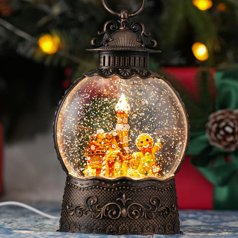 Qukulov front view of gingerbread snow globe showing warm light and festive charm