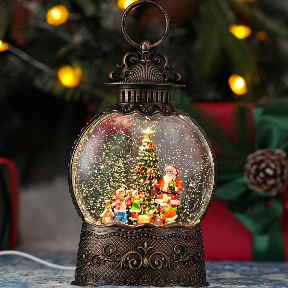 Qukulov snow globe front view showing warm light and festive scene for cozy ambiance