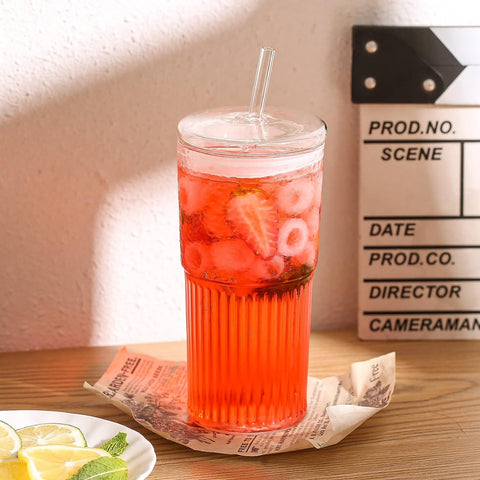 QWEZXO JOCHXXYR glass straw tip close-up showing reusable, non-plastic sipping advantage