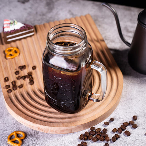 QWEZXO jar in use at backyard party highlighting social serving convenience