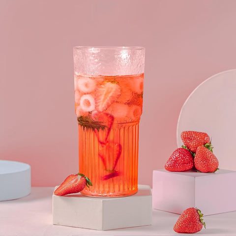 QWEZXO tumbler in use with iced coffee demonstrating chilled beverage clarity