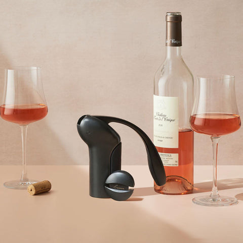Rabbit opener in use on bottle showing swift one-pull cork extraction advantage
