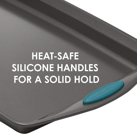 Rachael Ray pan with marine blue grips being lifted for safer handling