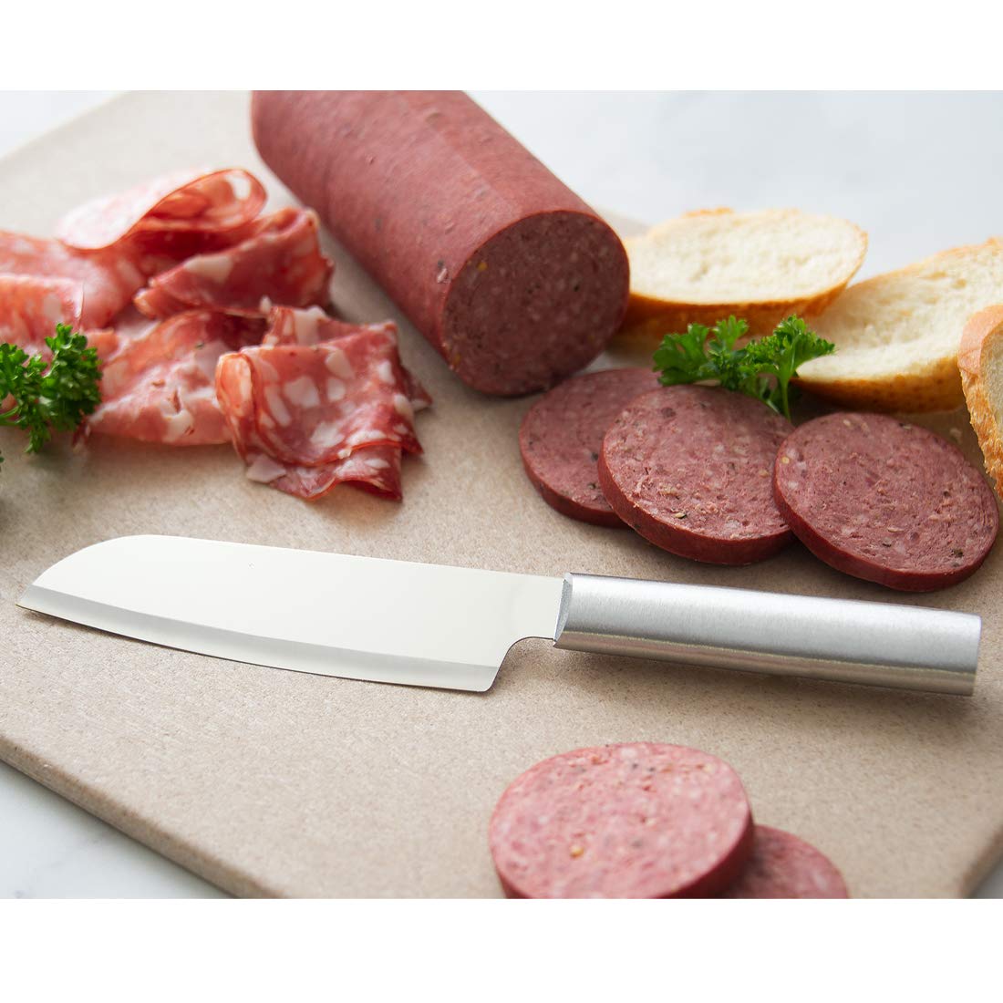 RADA knives slicing meat cleanly to demonstrate effortless cutting performance