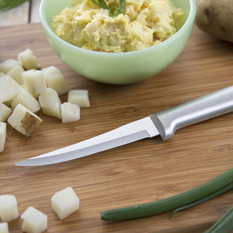 Rada paring knife trimming produce to demonstrate control for fine prep tasks