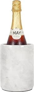 Radicaln marble next to a standard 750ml bottle illustrating size and fit