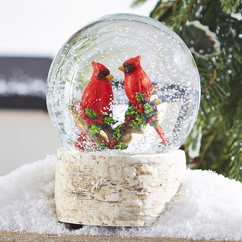 Raz globe close-up of cardinals and holly highlighting fine painted detail