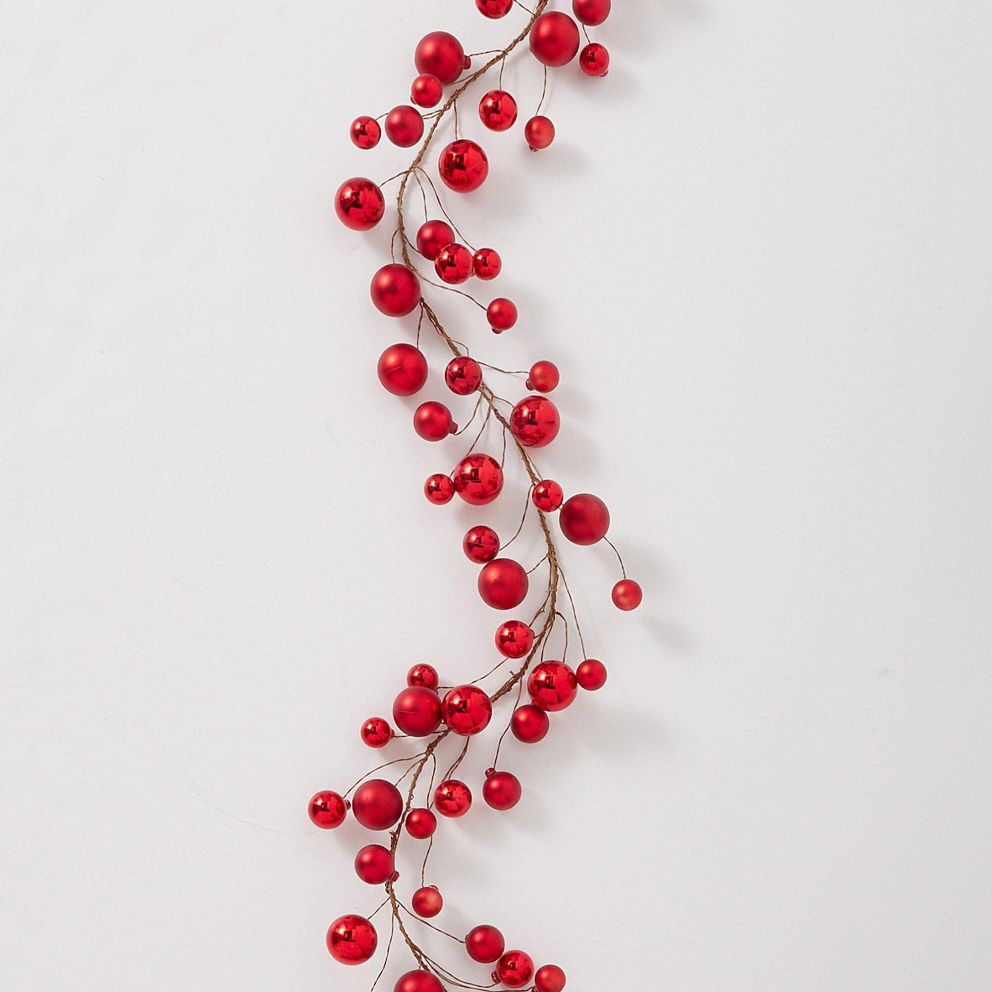 RAZ Imports garland draped on mantel adding instant festive color
