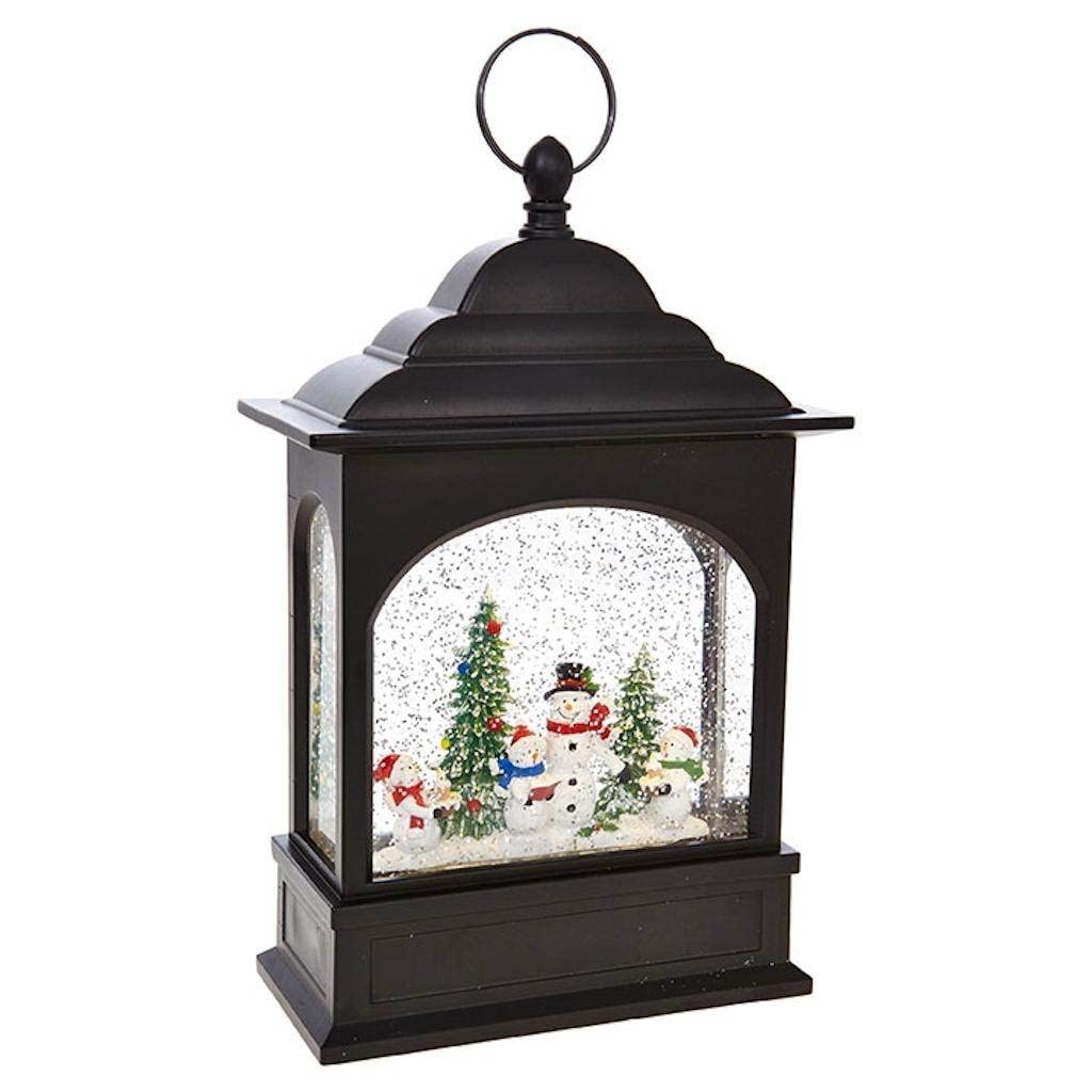 RAZ Imports front view snowman caroler lantern shows glowing glitter and music, festive ambiance