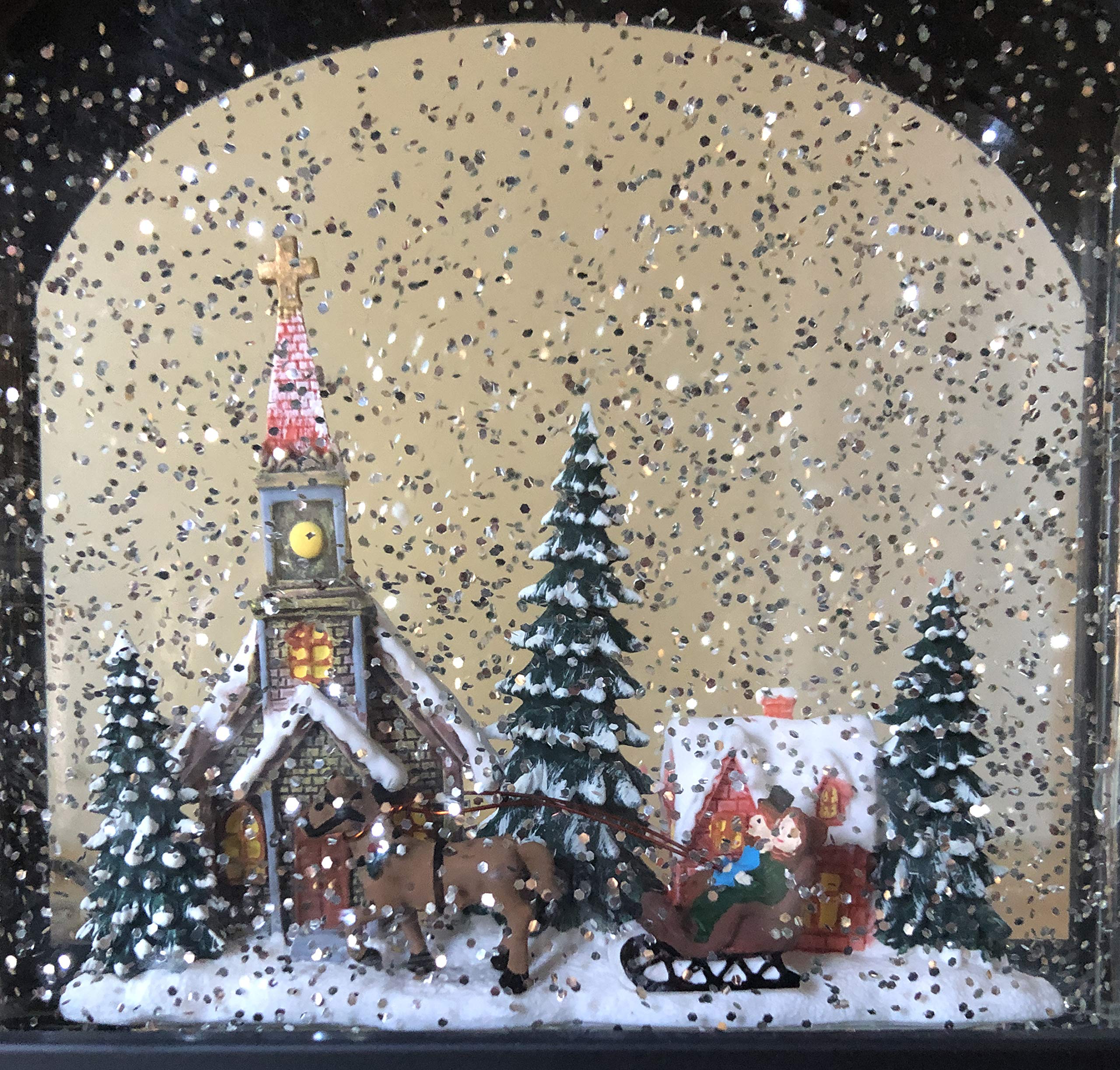 RAZ Imports lantern on mantel with holiday decor showing ambient light and festive mood benefit