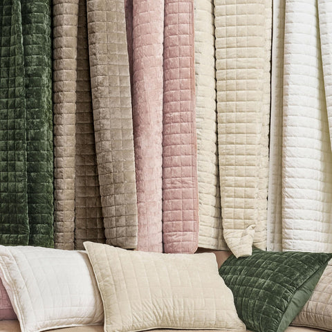 RECYCO folded quilt flatlay showing compact storage and soft feel
