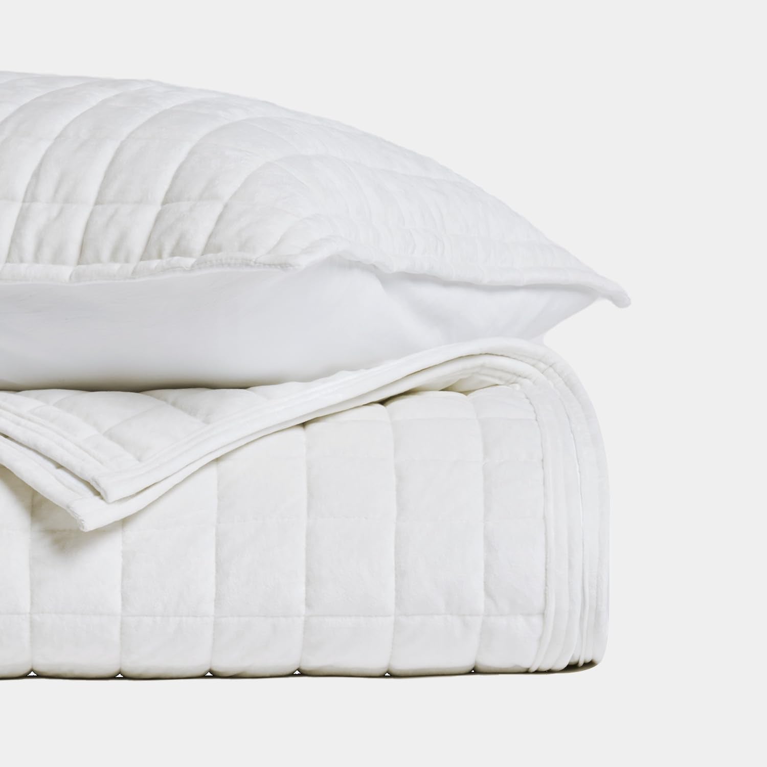 RECYCO folded quilt showing thickness and easy storage for everyday convenience