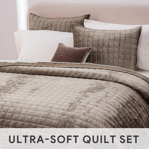 RECYCO quilt styled on bed demonstrating warm, inviting bedroom look