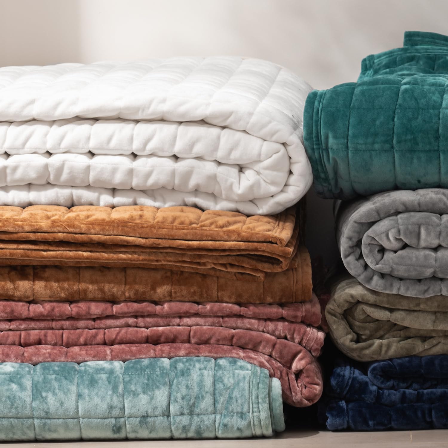 RECYCO quilt on king mattress showing full coverage and generous drop