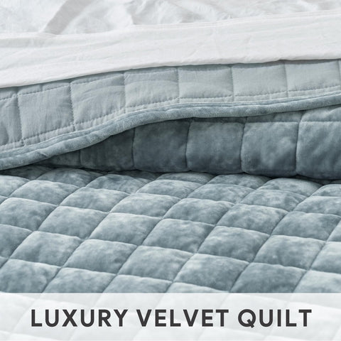 RECYCO quilt size and scale on mattress demonstrating full/queen coverage