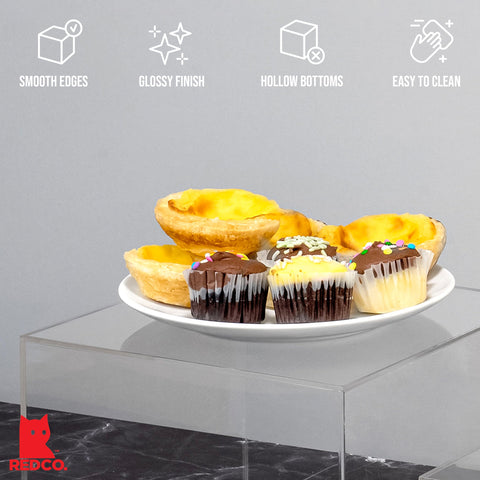 Red Co. stacked cubes in use creating multi-level presentation benefit