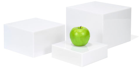 Red Co. front view of glossy white acrylic cube risers highlighting clean presentation