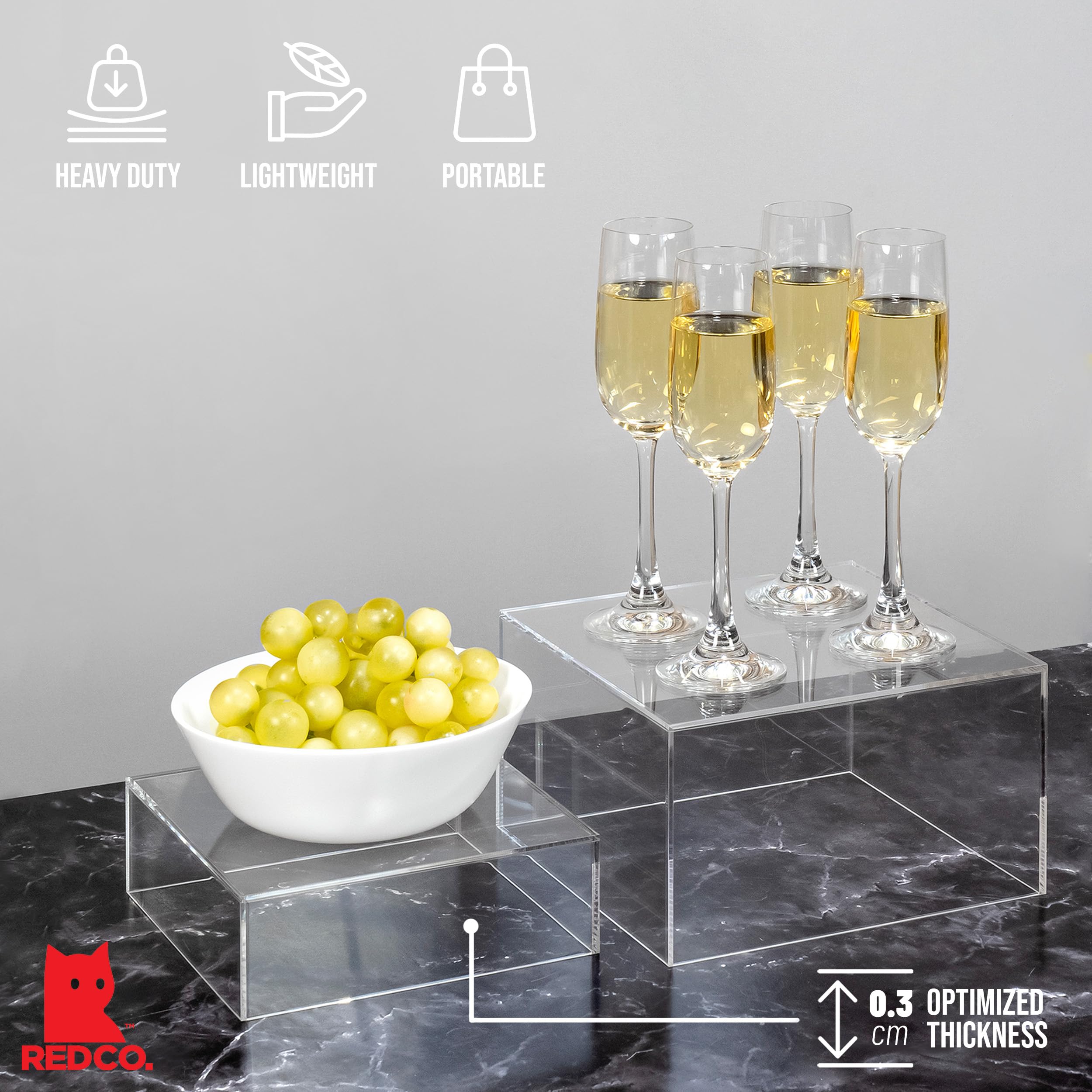 Red Co. large cube holding jewelry, elevates pieces for better display